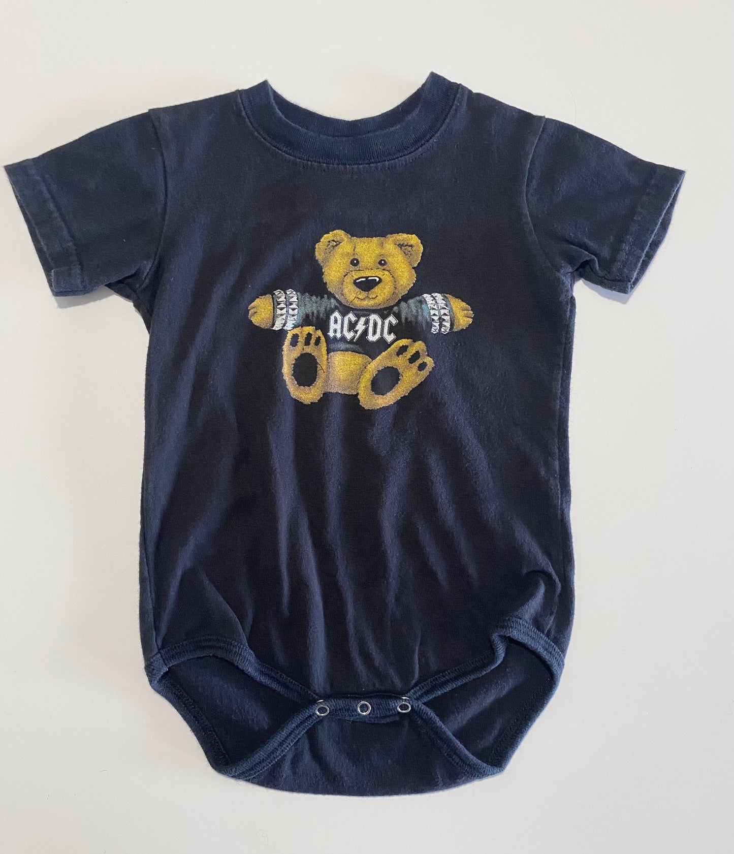 9-12 mois | Cache-couche AC/DC